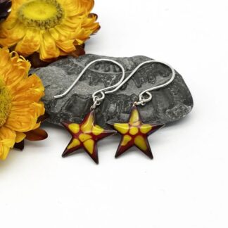 star shaped enamel earrings in red and yellow with silver ear wires