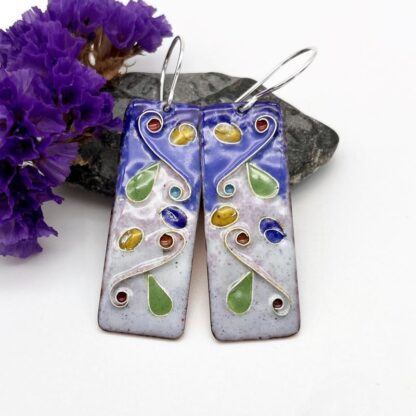 highly patterned cloisonne enamel earrings in blues and pinks on silver ear wires