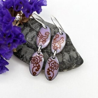 double oval drop earrings with pink and patterned enamel finish on silver ear wires